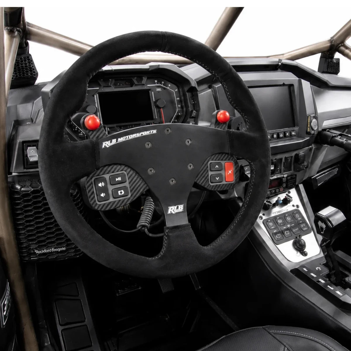 RLB 14-inch suede race wheel with factory buttons on the Adapt-IQ mount in a Polaris Pro R